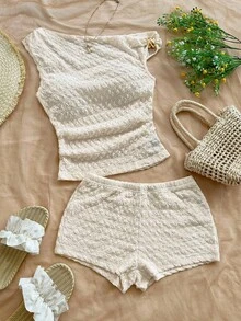 Soleia Bộ 2 món áo crop top xếp ly ánh kim cổ lệch gợi cảm và quần short cạp thấp cho nữ, thích hợp cho tiệc tùng, giáng sinh, đêm hẹn hò, hộp đêm, bãi biển, du ngoạn, trà chiều, bohemian, boho, kỳ nghỉ, quần áo nữ mùa thu, cổ điển - Màu be - Xem 1