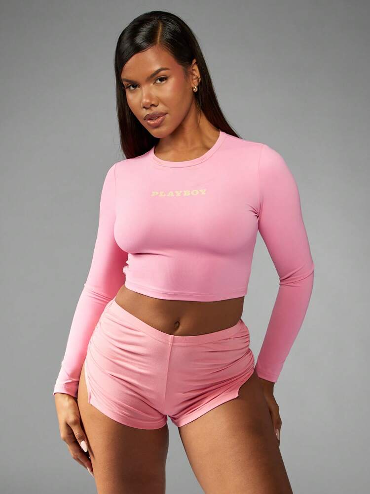 Missguided x Playboy クロスバックデザインのロングスリーブクロップトップ