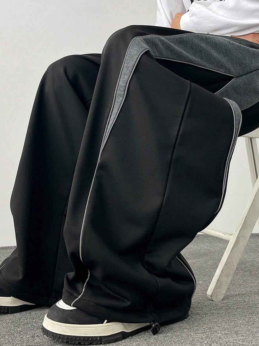 Claim Dot Pantalon de survêtement casual à jambes larges et couleurs contrastées pour hommes