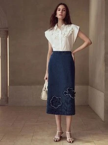 MOTF STUDIO 刺绣不对称下摆牛仔裙
