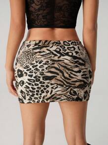 SHEIN ICON Jupe mini moulante femme style boho vintage pour sortie sexy et vacances. Imprimé patchwork léopard et tigre, avec nœud décoratif et fente à l'ourlet. Jupe d'été imprimé animal