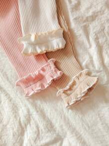 Vintaside Kids 这款女婴三件套春秋季打底裤套装，包含粉色、白色和杏色三种柔和色调，满足不同场合的需求。秋冬季时尚百搭。 - 彩色 - 查看 4