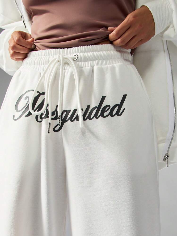 MISSGUIDED Pantaloni palazzo con gamba ampia, con logo a scritta, vita con coulisse, pantaloni comodi per l'inverno e l'autunno, abbigliamento casual da passeggio