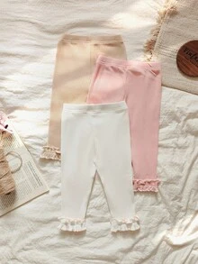 Vintaside Kids 这款女婴三件套春秋季打底裤套装，包含粉色、白色和杏色三种柔和色调，满足不同场合的需求。秋冬季时尚百搭。 - 彩色 - 查看 2