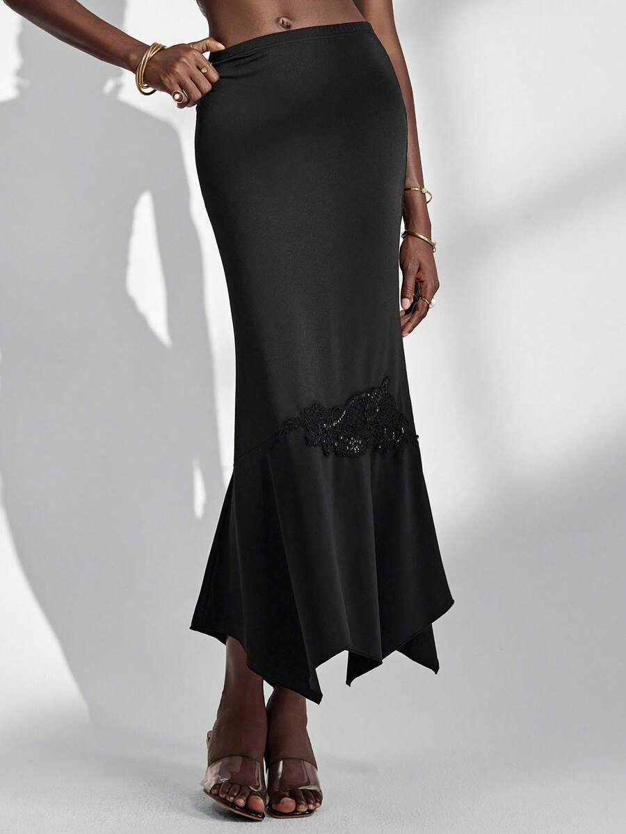 Almamuse Schwarzer gestrickter Bodycon-Rock, eleganter asymmetrischer Saum, Applikation, vielseitiger modischer Damenrock, Frühling/Herbst