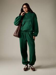 MISSGUIDED Sudadera con capucha de estilo vintage de deportes universitarios con texto en relieve, bolsillo central con cordón, estilo otoño-invierno, sudadera holgada de estilo campus - Verde - Ver 3