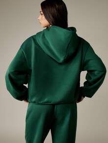 MISSGUIDED Sudadera con capucha de estilo vintage de deportes universitarios con texto en relieve, bolsillo central con cordón, estilo otoño-invierno, sudadera holgada de estilo campus - Verde - Ver 2