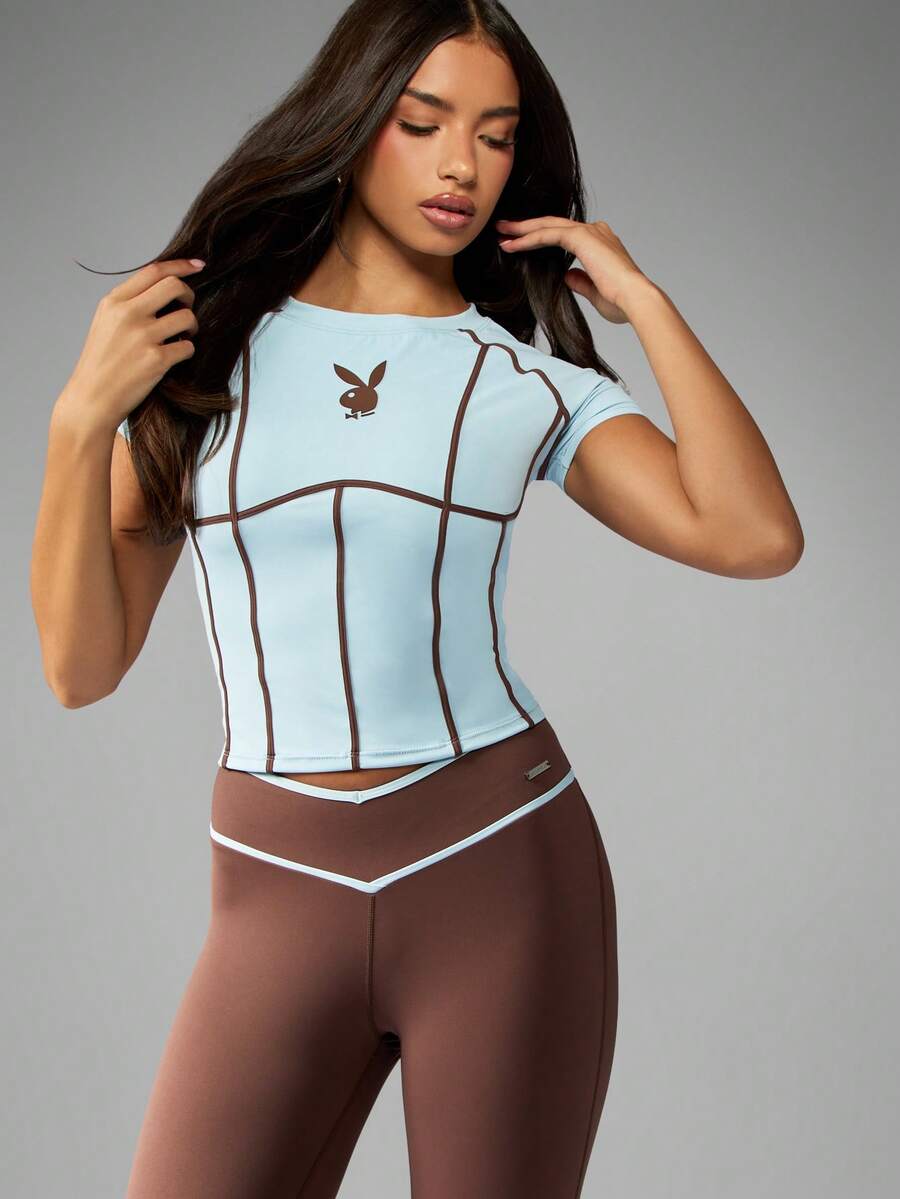 Missguided x Playboy Camiseta deportiva de manga corta color azul con ribete de contraste marrón y logo de conejo - Azul - Ver 1