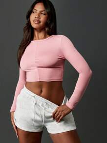 MISSGUIDED Áo crop top dài tay thể thao Áo thun thể thao liền mạch nhún bèo ở giữa phía trước tập luyện chạy bộ tập luyện Áo thun thể thao Yoga Đồ thể thao Quần áo tập thể dục - Bụi hồng - Xem 1