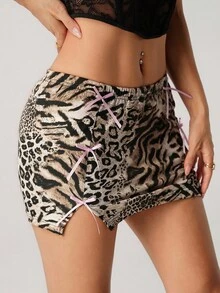 SHEIN ICON Jupe mini moulante femme style boho vintage pour sortie sexy et vacances. Imprimé patchwork léopard et tigre, avec nœud décoratif et fente à l'ourlet. Jupe d'été imprimé animal