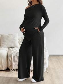SHEIN 2pcs Maternity Casual Solid Asymmetric Top And Pants Set Pregnant Two Piece Set Black Maternity Two Piece Set Maternity Clothes Two Piece Set Maternity Two Piece Outfit Pregnancy Outfits - Black - View 3