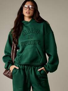 MISSGUIDED Sudadera con capucha de estilo vintage de deportes universitarios con texto en relieve, bolsillo central con cordón, estilo otoño-invierno, sudadera holgada de estilo campus - Verde - Ver 1