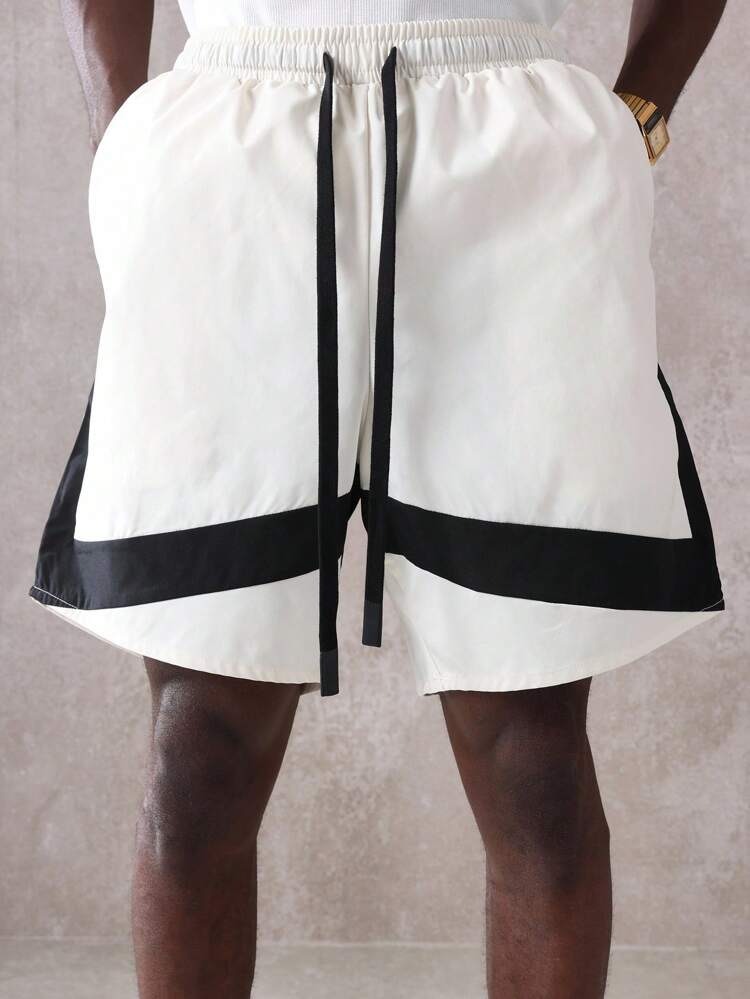 Camisa combina com jaqueta esportiva e shorts
