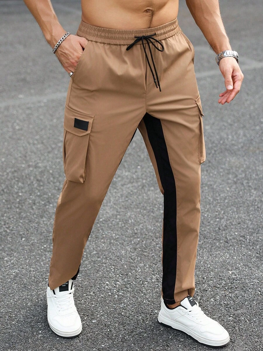 Manfinity LEGND Męskie spodnie casualowe w kontrastowym kolorze ze ściągaczem w pasie i kieszeniami cargo, jesień - Kolor khaki - Zobacz 1