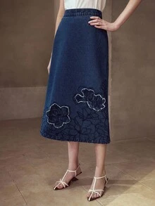 MOTF STUDIO 刺绣不对称下摆牛仔裙