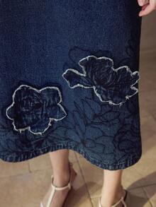 MOTF STUDIO 刺绣不对称下摆牛仔裙