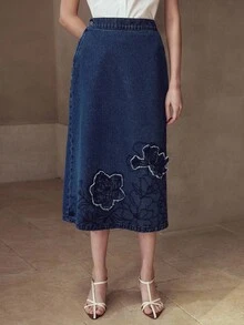 MOTF STUDIO 刺绣不对称下摆牛仔裙