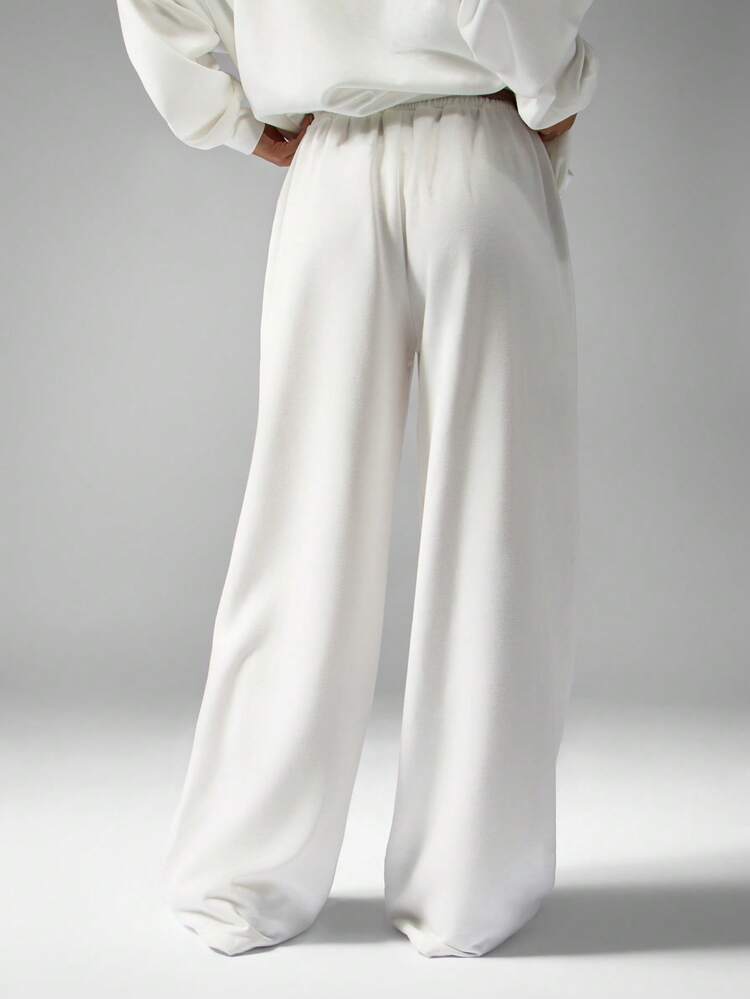 MISSGUIDED Pantaloni palazzo con gamba ampia, con logo a scritta, vita con coulisse, pantaloni comodi per l'inverno e l'autunno, abbigliamento casual da passeggio