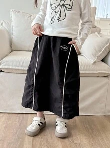 Genkimix Kids 年轻女孩斜口袋装饰休闲迷你裙 - 黑色 - 查看 1