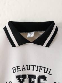 SHEIN Explorewe Conjunto de Suéter e Saia Casual Diário Simples para Meninas Jovens: Suéter de Cor Sólida com Estampa de Letra, Saia Curta. Um Conjunto Simples de Duas Peças de Cor Sólida para Meninas no Outono. Roupas Universitárias e Roupas Esportivas para o Campus na Temporada de Volta às Aulas 2025 - Preto - Visão 6