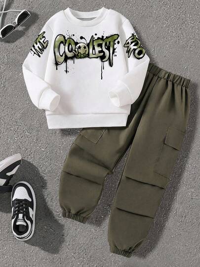 2pcs/Set Young Boy White Crew Neck Long Sleeve Sweatshirt And Green Cargo Pants, Street Graffiti Face Fashion Outfit, Suitable For All Seasons Chic Outfits For Autumn/Winter Kids Jogger Sets Set Boys Outfits Boys Graphic Sweatshirt And Pants Set Boys Autumn Winter Casual Two Piece Set Boys Outfit Set Fall