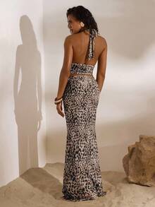 Opulessa Conjunto de 2 piezas de top halter ajustado y corto con estampado de leopardo y falda de cola de pez de talle bajo para mujeres