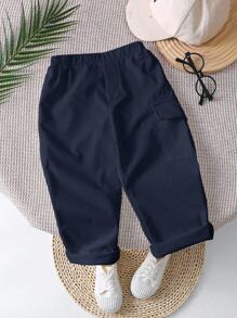 SHEIN Quần dài lưng thun co giãn màu trơn, thích hợp cho mùa xuân/hè, dành cho cả bé trai và bé gái - Màu xanh hải quân - Xem 9