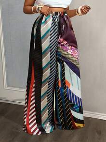 Slaydiva Pantalon évasé ample pour femmes grandes tailles, collection Printemps-Été 2025. Présentant un imprimé tie-dye sur tissu satiné pour le streetwear, les sorties casual, les fêtes et les rassemblements sociaux