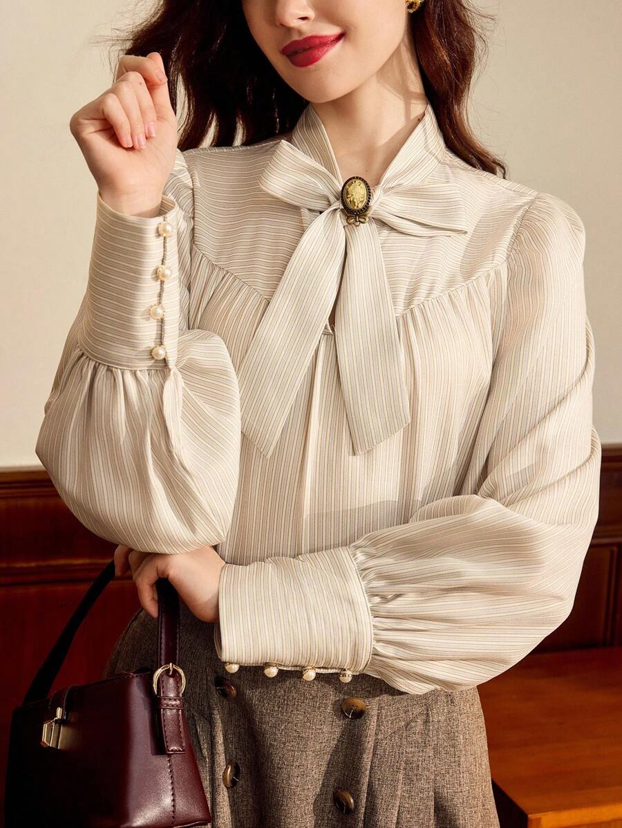 Vintamour 复古优雅女士条纹蝴蝶结衬衫休闲度假长袖上衣秋季女装冬季女装商务休闲女装办公室女装工作女装西式女装秋季女装工作服秋季女装圣诞节教师衬衫秋季上衣教堂女装长袖衬衫早午餐女装节日女装机场女装优雅女式衬衫学校 - 杏色 - 查看 1