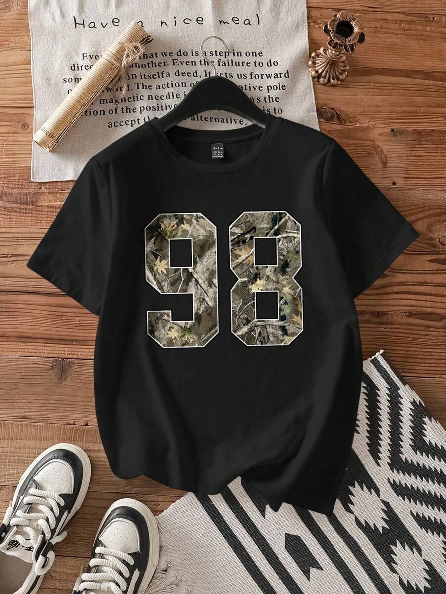 SHEIN Attitoon Camiseta casual de mujer de manga corta, cuello redondo, con diseño de hojas sueltas, adecuada para el verano - Negro - Ver 1