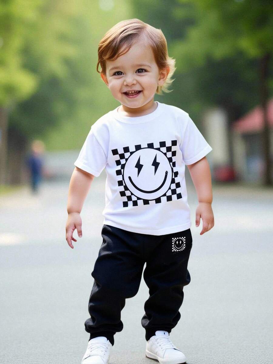 SHEIN Bộ quần dài tay ngắn cổ tròn họa tiết hoạt hình dễ thương phong cách Y2K cho bé trai mùa thu mới thoải mái, giản dị, phong cách graffiti - Nhiều màu - Xem 1