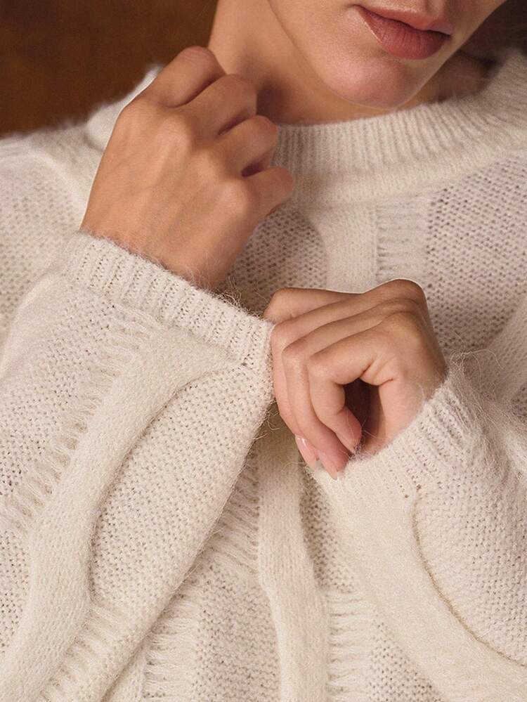 Maglione oversize in maglia lavorata a trama solida con spalle a caduta