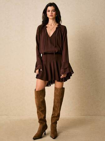 Poéselle Damklänning med utsvängda ärmar och enfärgad semester- och avslappnad passform