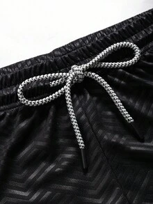 Manfinity Sport Corelite Pantalones cortos deportivos con estampado de lema de ala y cruz para hombres - Negro - Ver 4