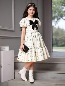 Elegant Vintage Floral Print Pleated Dress With Bowknot For Tween Girls, Loose Fit, Round Neck, Short Sleeve, Mid-Length - Apricot - View 1