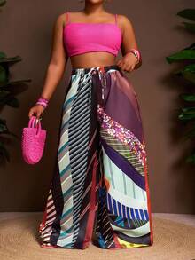 Slaydiva Pantalon évasé ample pour femmes grandes tailles, collection Printemps-Été 2025. Présentant un imprimé tie-dye sur tissu satiné pour le streetwear, les sorties casual, les fêtes et les rassemblements sociaux