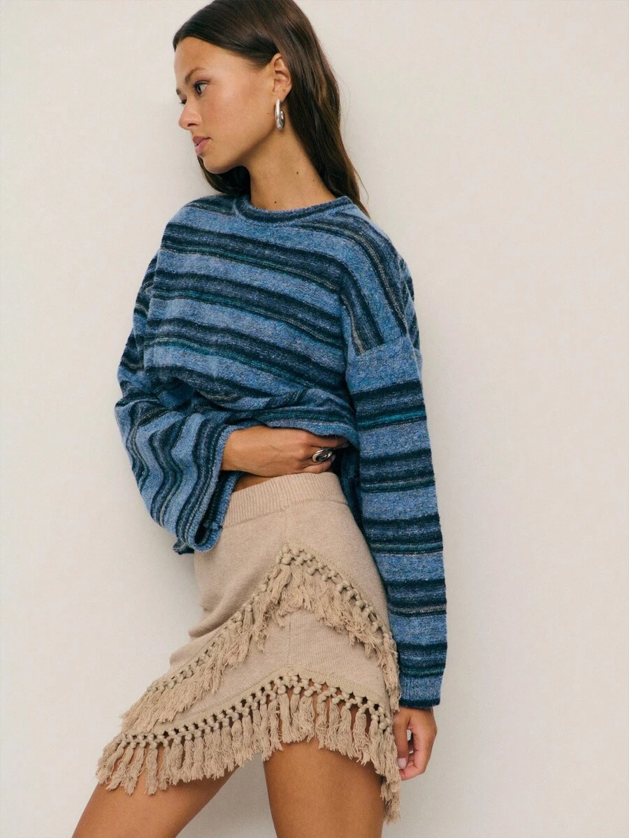 Nöista 米色针织迷你裙，流苏装饰，俏皮动感。这款别致的裙子为女性秋季服装增添了一丝波西米亚风情，非常适合秋季节日、派对，或搭配外出上衣，打造休闲又不失优雅的造型。 - 杏色 - 查看 1