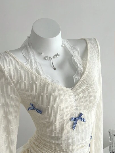 Elamini 蝴蝶结对比蕾丝挂脖褶饰腰部修身长袖 T 恤