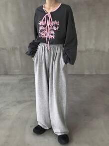 FRIFUL 女士圆领蝴蝶结撞色宽松前印花休闲长袖T恤，秋季/春季 - 黑色 - 查看 6