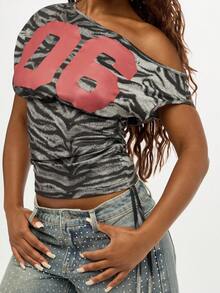 SUMWON WOMEN Off Shoulder Animal Print Crop Top With Number Graphics Ruched Drawstring Side Fall Casual Y2K Fashion Statement Zebra Pattern Retro Style 90s Look - Black and White - View 3