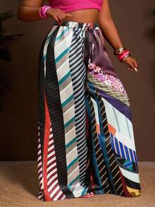 Slaydiva Pantalon évasé ample pour femmes grandes tailles, collection Printemps-Été 2025. Présentant un imprimé tie-dye sur tissu satiné pour le streetwear, les sorties casual, les fêtes et les rassemblements sociaux