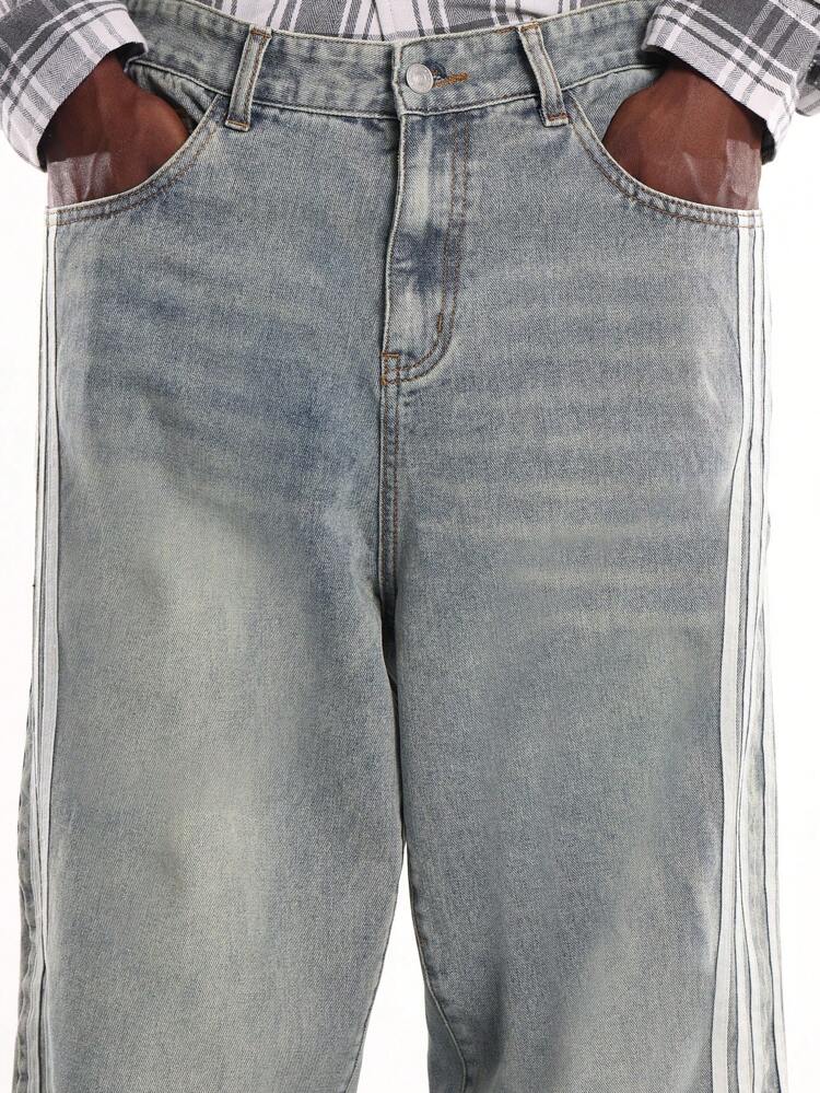 사이드 스트라이프가 있는 라이트 워시 데님 와이드 레그 진