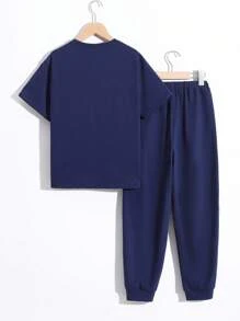若い男性用 カジュアル&シンプルなレタープリント 半袖Tシャツ パンツセット 2点、ゆったりとした着心地で、外出、学校、バケーション、パーティー、スポーツ、春夏に最適 - ロイヤルブルー - チェックする 2