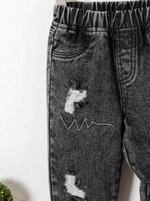 SHEIN Playful Pals Pantaloni di jeans svasati semplici e casual ricamati per ragazzo in autunno