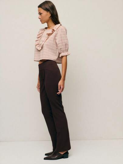 Nöista High-Waisted Pants With A Flattering Waistline And Leg-Lengthening Effect, Featuring A Straight And Slightly Fitted Silhouette With Clean Seams That Enhance The Shape; The Stretchy Fabric Offers A Versatile And Comfortable Fit, Making Them An Elegant Winter Essential For Everyday Wear, Christmas Gatherings And Refined New Year Looks.