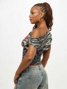 SUMWON WOMEN Off Shoulder Animal Print Crop Top With Number Graphics Ruched Drawstring Side Fall Casual Y2K Fashion Statement Zebra Pattern Retro Style 90s Look - Black and White - View 2