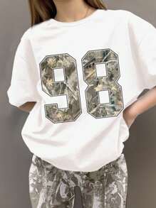 SHEIN Bộ 2 món/Bộ thể thao đường phố cổ điển dành cho nữ sinh trung học Digit 98 họa tiết lá cây ngụy trang & in hình lá héo úa, áo phông cổ tròn tay ngắn rộng rãi và quần ống loe, phù hợp cho mùa hè, mùa thu - Nhiều màu - Xem 3