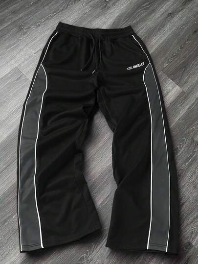 Manfinity EMRG Pantalones de chándal casuales y versátiles con parches de colores contrastantes para hombres