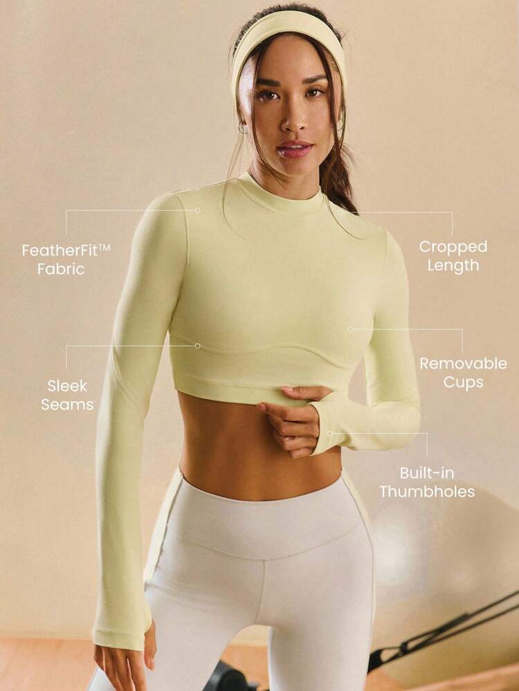 FeatherFit™ Flattering Seams Cropped Length Long-Sleeve Top With Thumbholes Low Impact Yoga Pilates Studio Daily Casual Wear Removable Cups  Spring Summer
