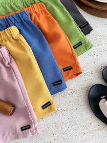 SHEIN Conjunto de 6 pantalones cortos casuales con cintura elástica y adornos para bebés niños y niñas